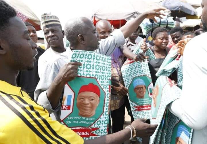 After Tinubu’s Visit, Orji Kalu’s “THANK YOU BUHARI WRAPPERS” Flood APC National Secretariat, Abuja Markets (PHOTOS)