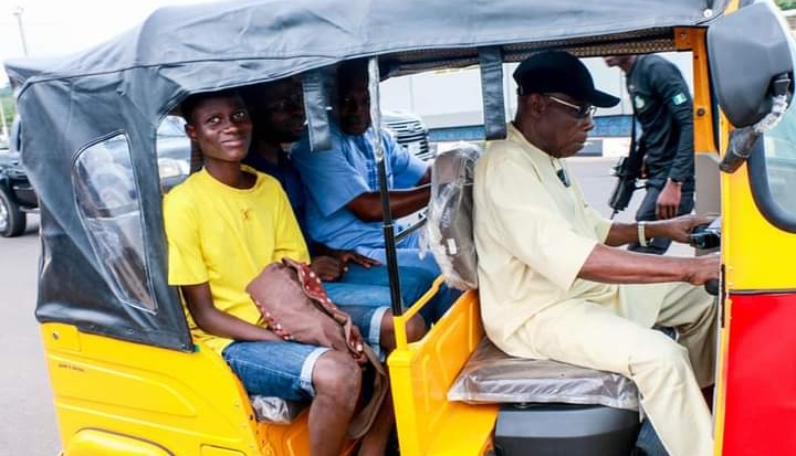 Former President Obasanjo Rides Keke To Pick Passengers (Photos)